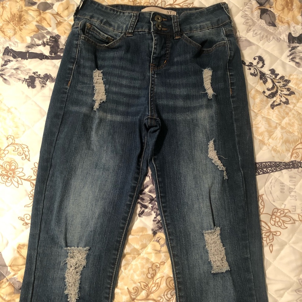 High rised distressed blue jeans